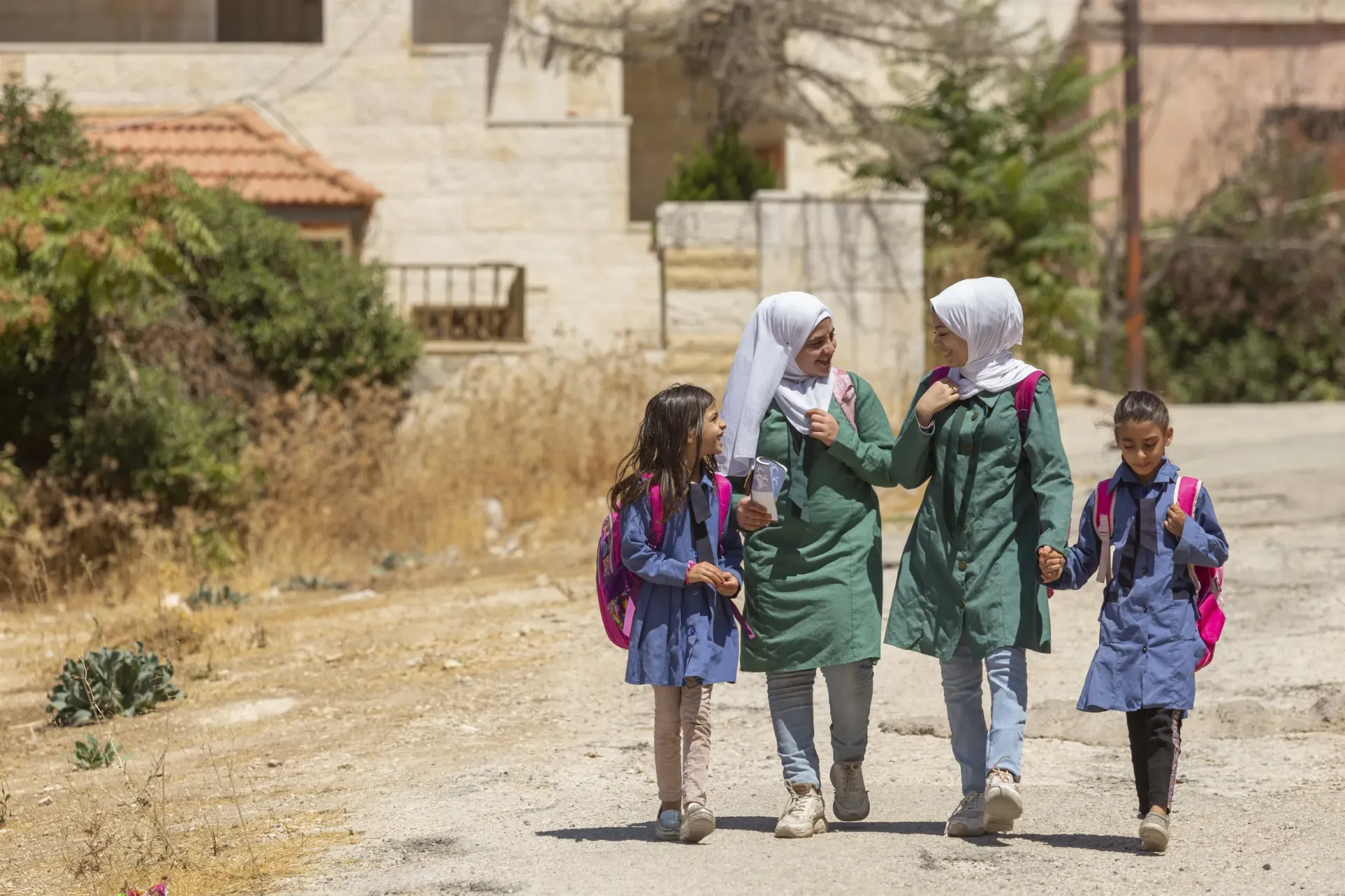 Four girls walking.