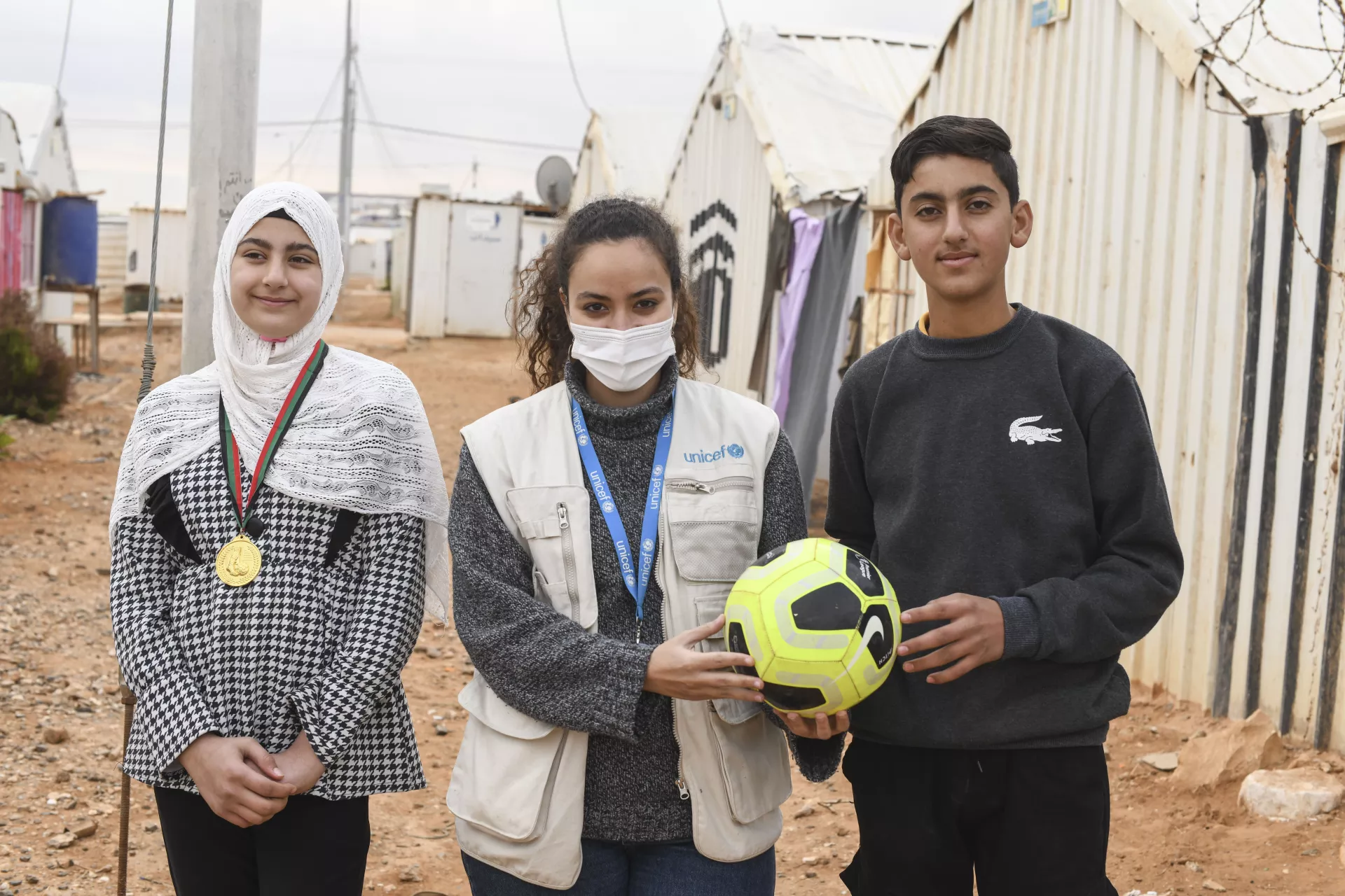 Noran Adly with youth in the camp.