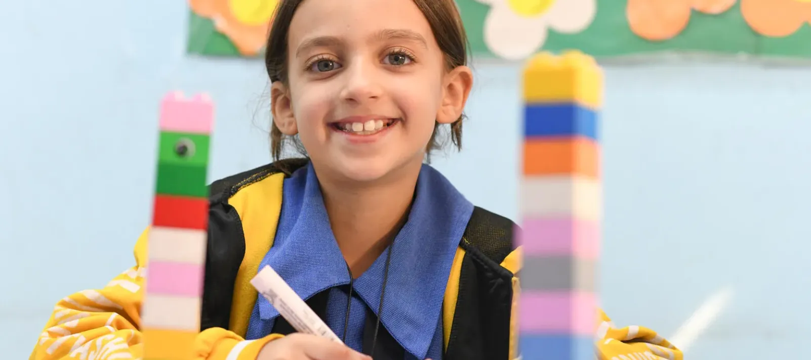 A girl smiling. 