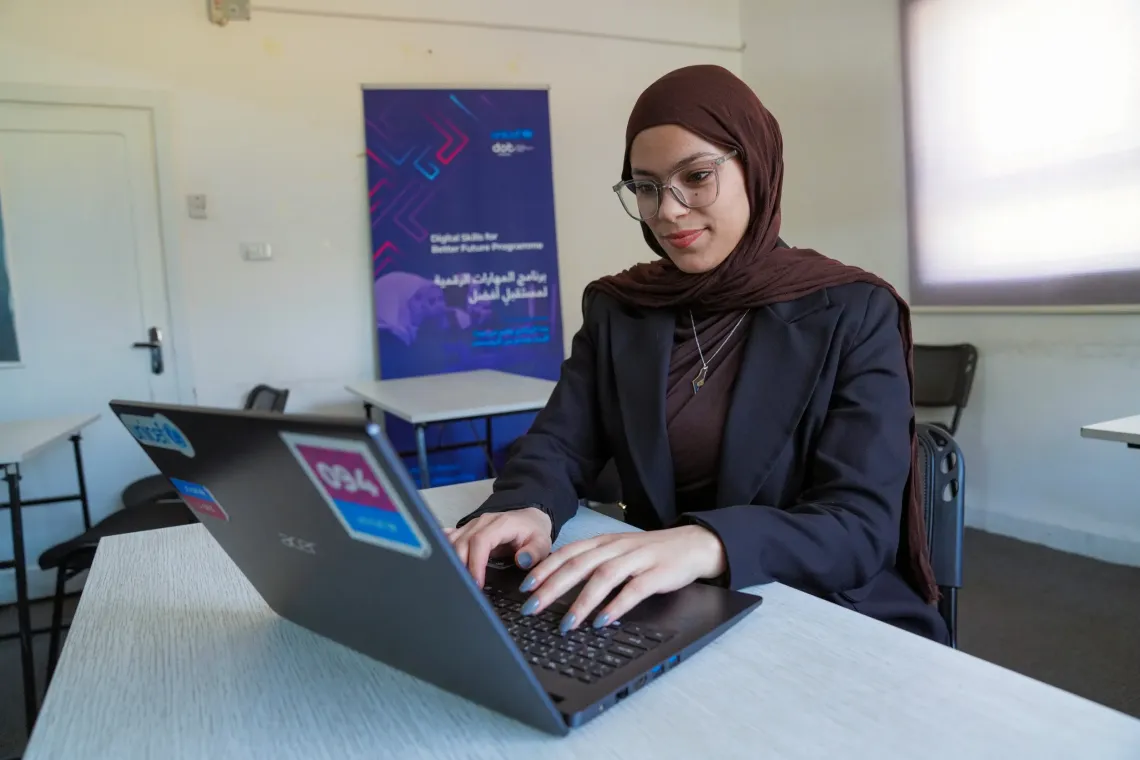 Bara'a using her newly acquired digital skills. 