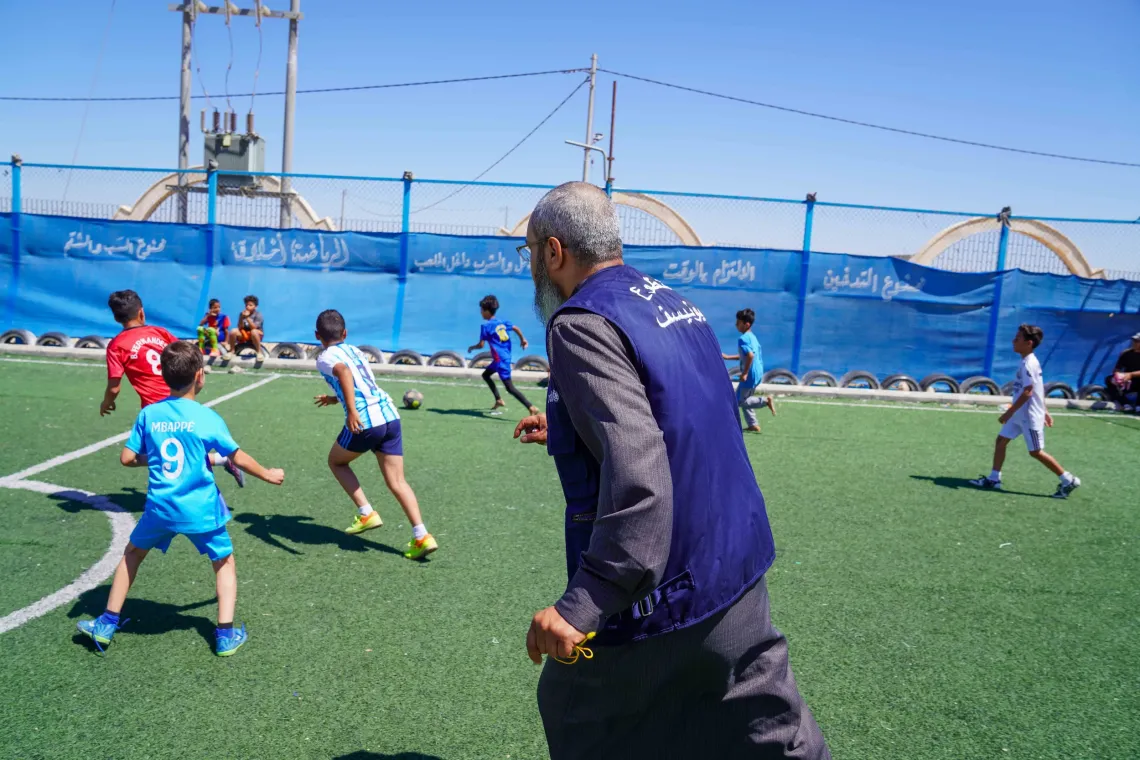  Abu Sham coaches football at Garden Camp