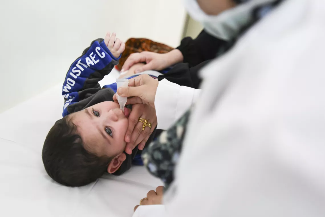 Rashed, 6 months old, getting vaccinated