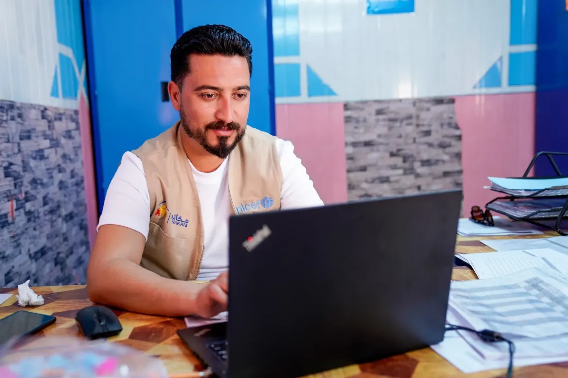 A man using a computer. 