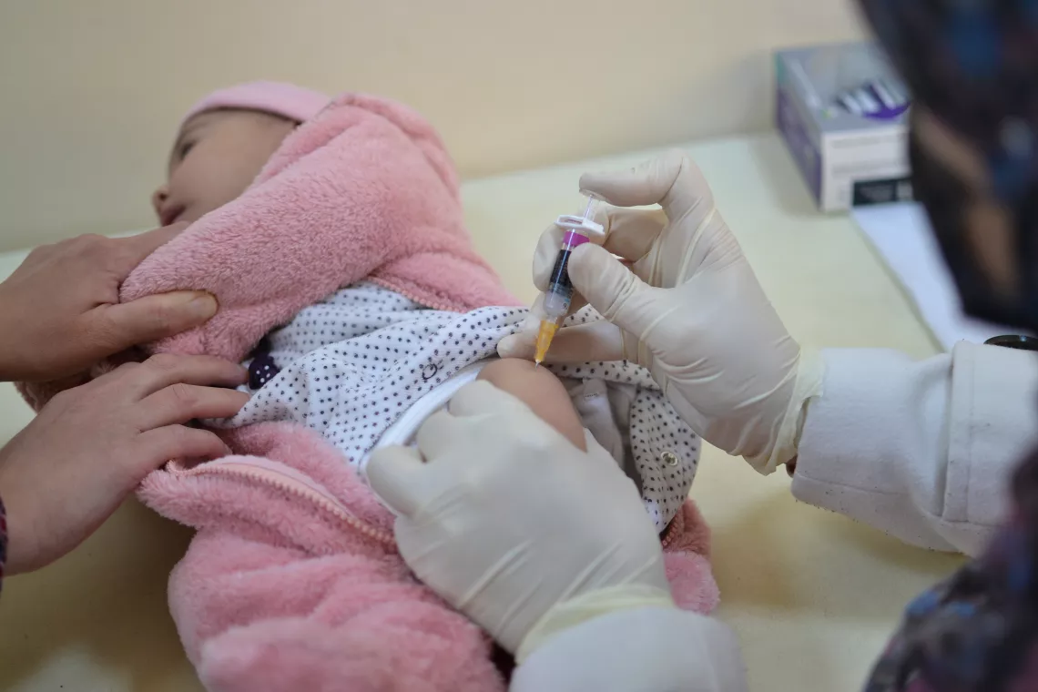 Zeina getting vaccinated.