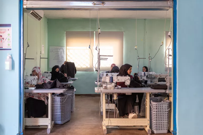 Women participating in the tailoring workshop 