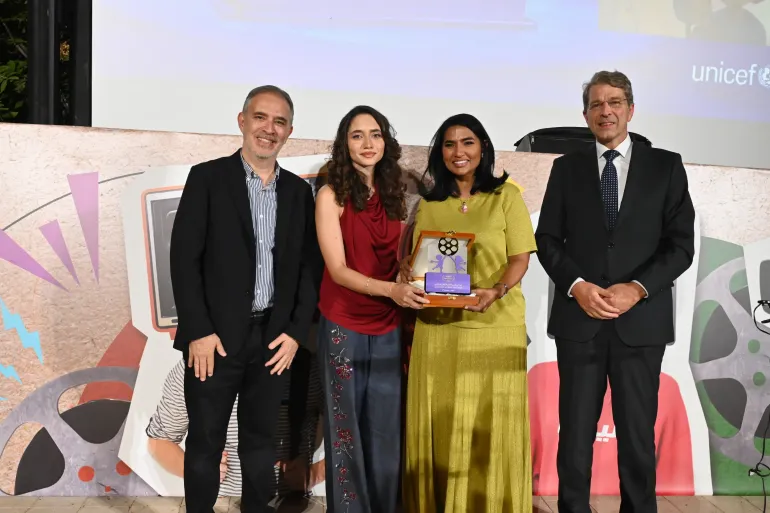 Group photo with the winner of the award.
