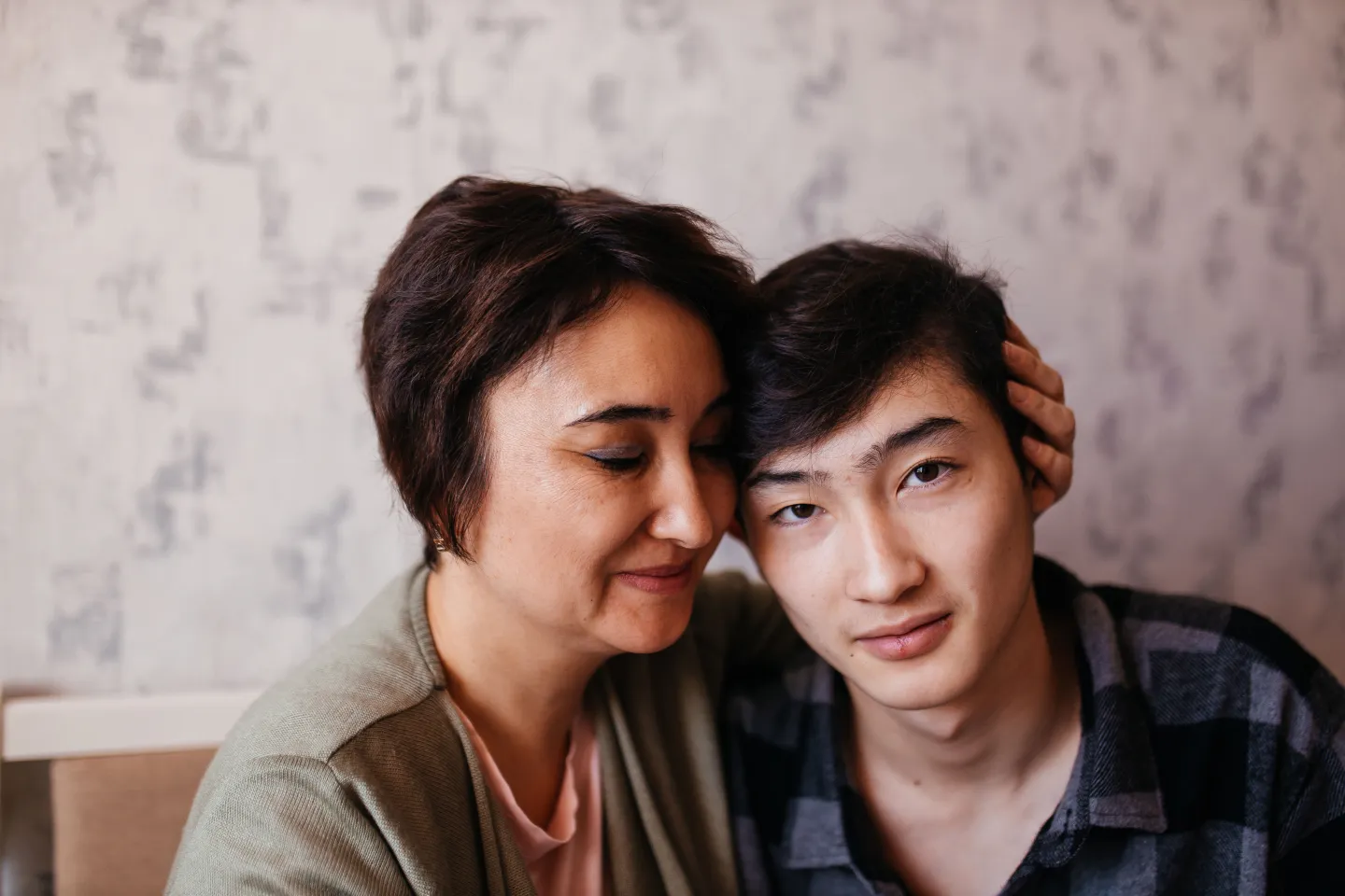 Aizhan Yerulanova and her son, Yerasyl (16). Ust-Kamenogorsk, Kazakhstan.