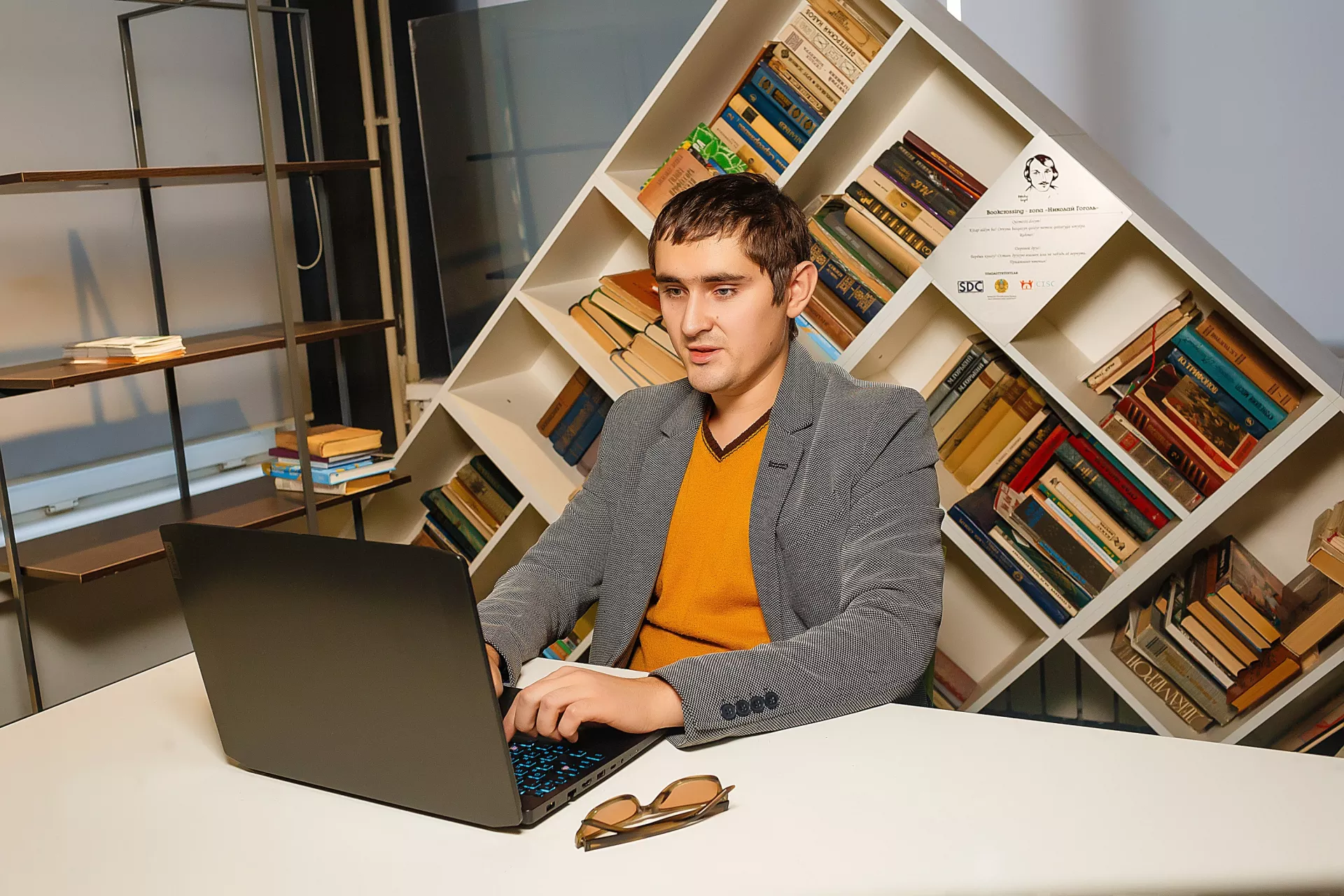 A person with disability works with a computer