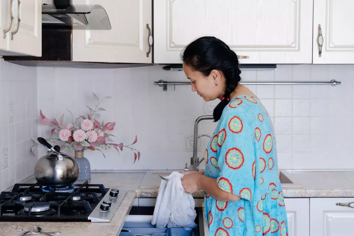 a woman in the kitchen