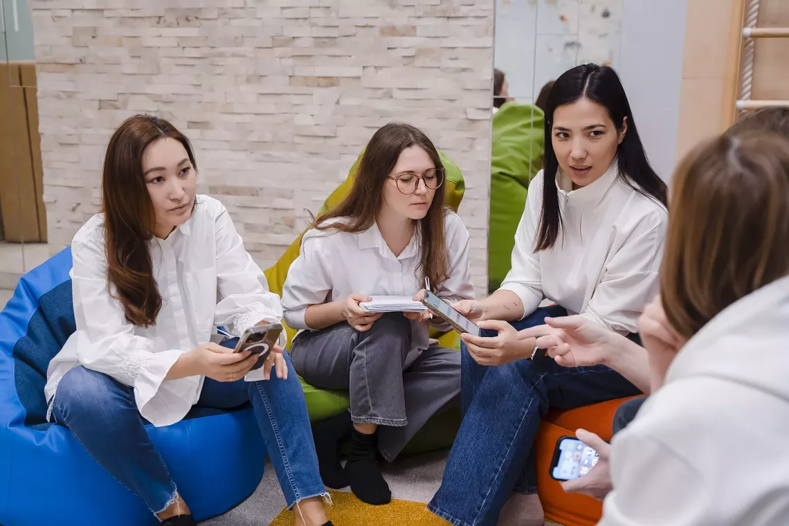 3 women in a room