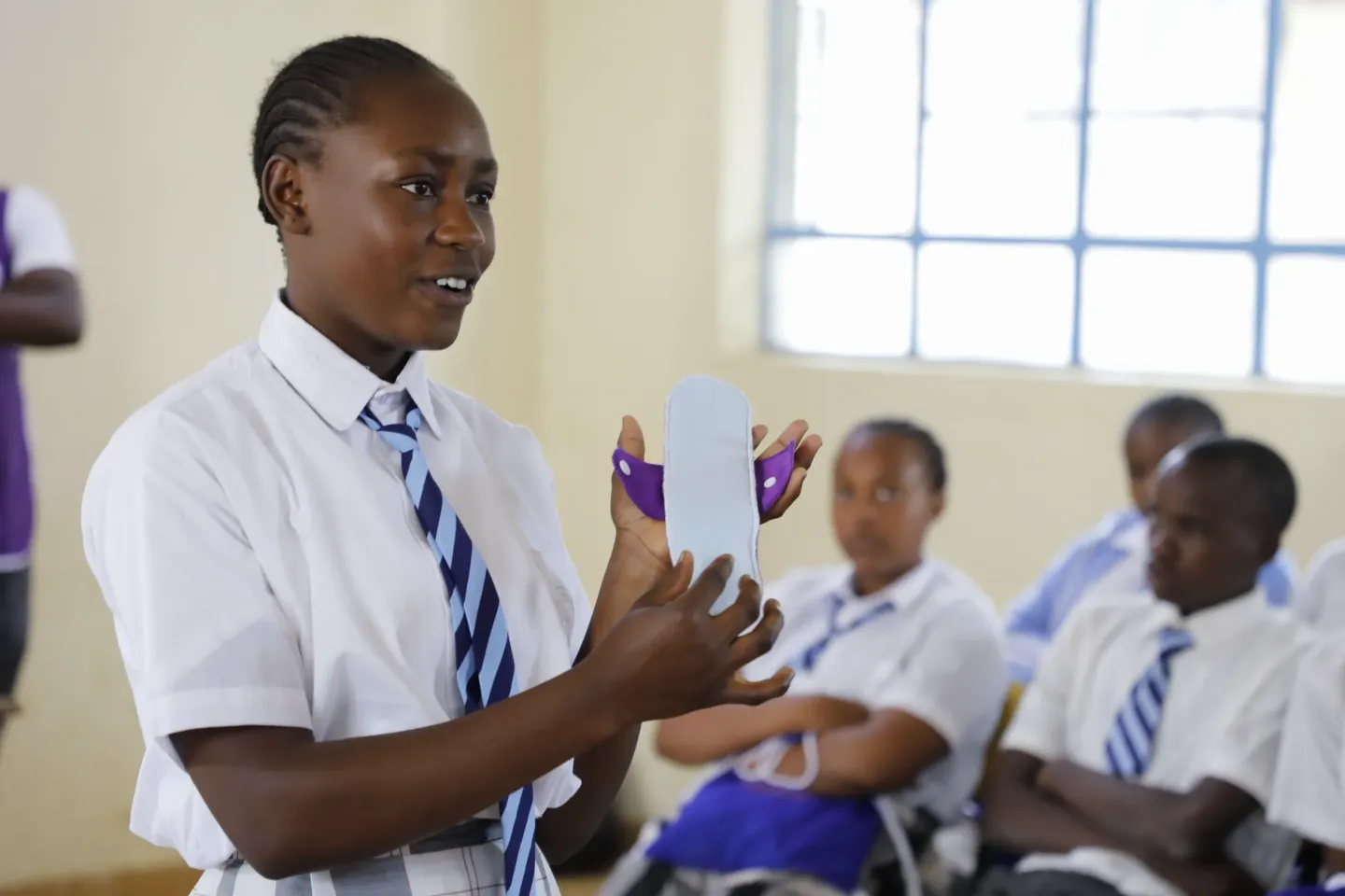 Destiny Blessing, 15, a Grade 9 pupil at Ngunyumu Comprehensive School, demonstrates during a menstrual hygiene session during health club meeting at the school.