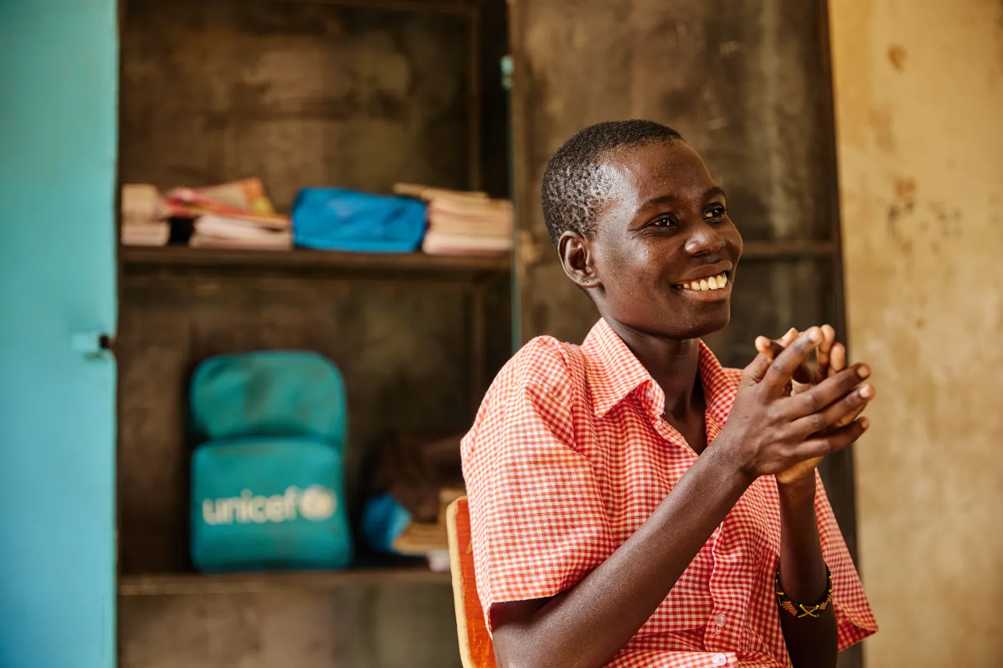 Arukudi speaks to UNICEF in a classroom at St Bernadette School for the Deaf