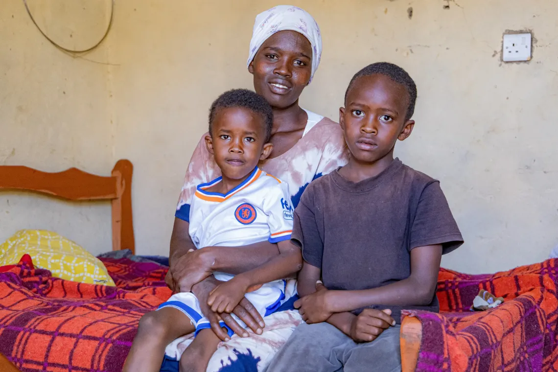 Evalin Namuli with her two sons
