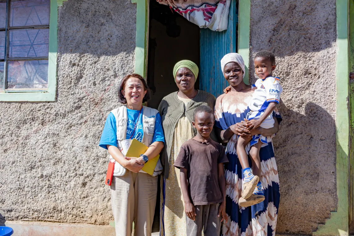 Evalin and her boys, Nelan and Liam, with UNICEF Kenya Chief of Communication, Michelle Borromeo