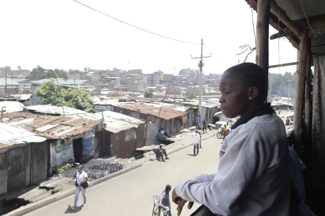 Diane looks out over the rusted rooftops of Korogocho informal settlement