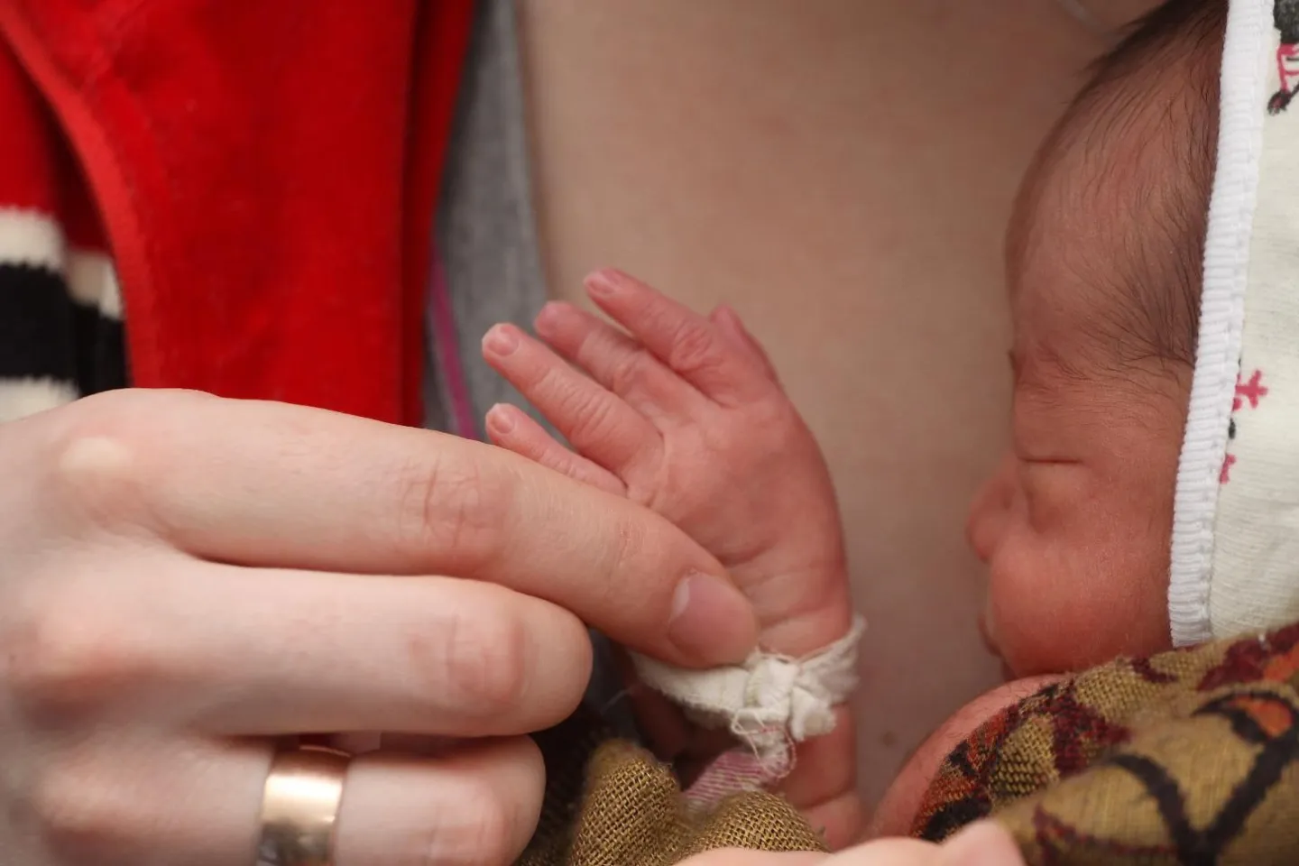 A new mother holds her baby