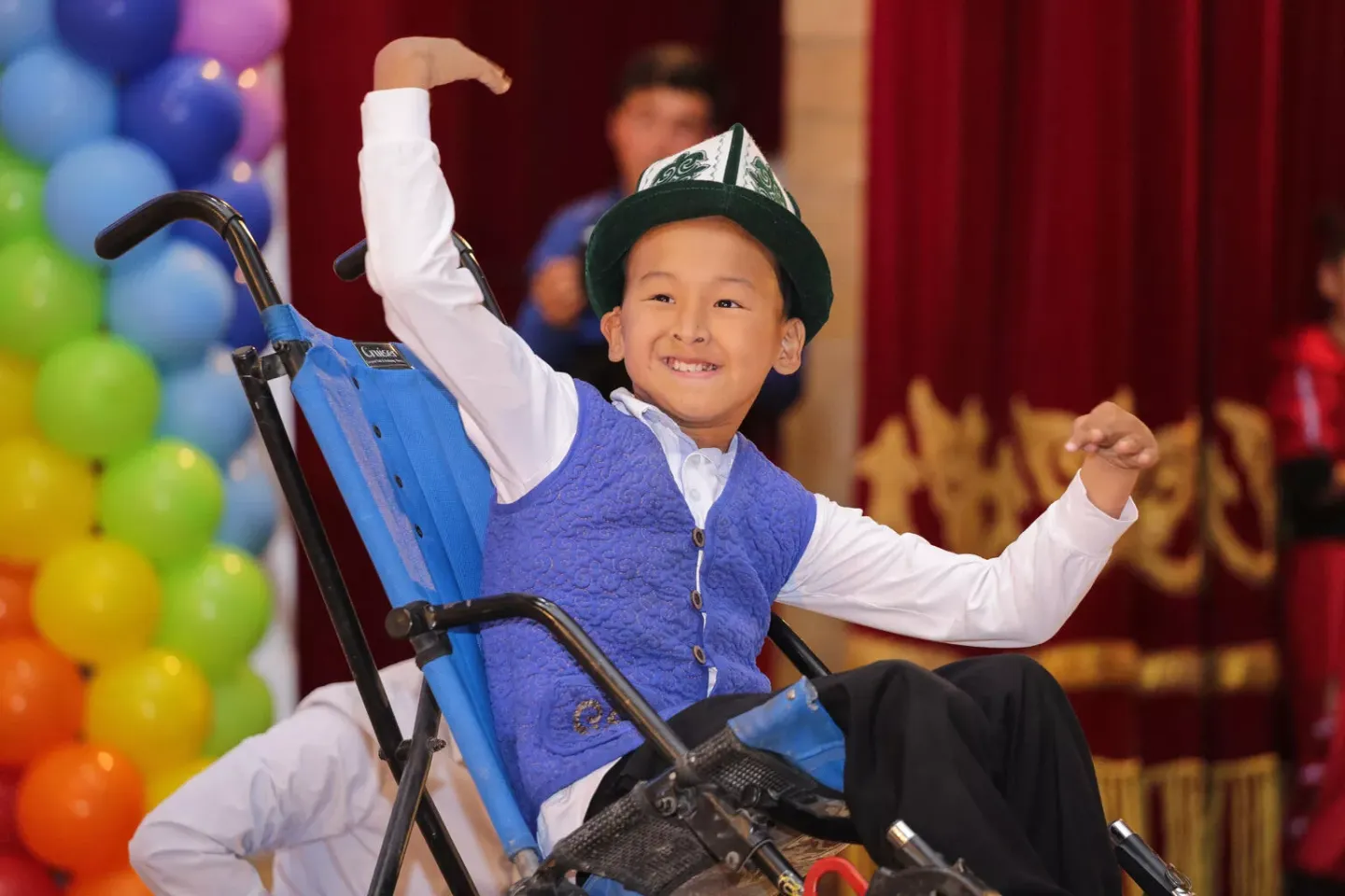 a boy in a wheelchair