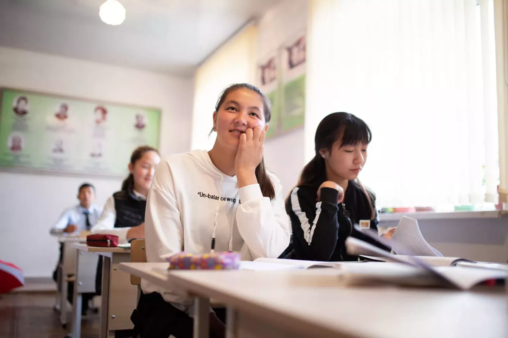 teenage girls studying