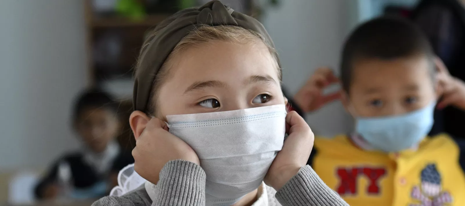 Schoolgirl in a mask