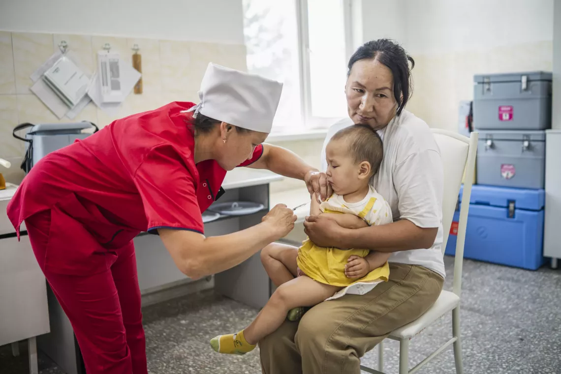 One year old Fatima is getting her MR vaccine 