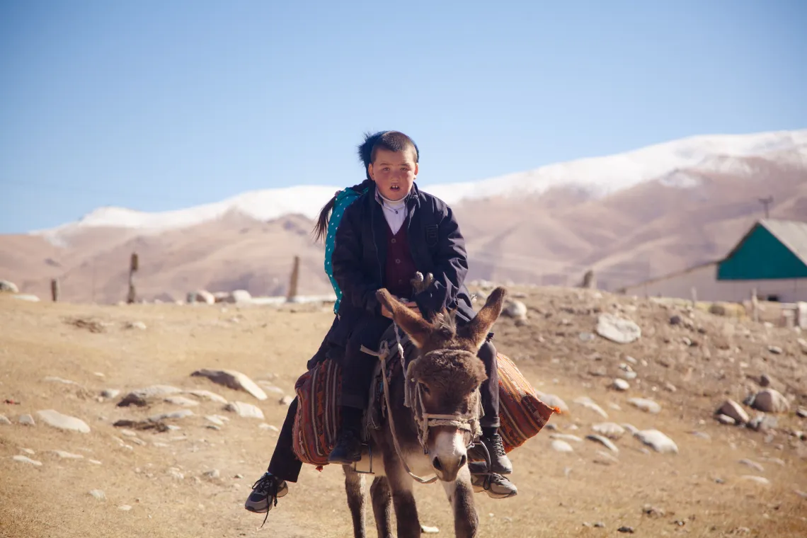 Nurzada and Nurislam use &lsquo;kurdjun&rsquo;, a nomadic bag thrown over the saddle, to carry their backpacks.