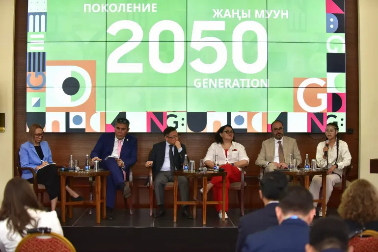 A photo with speakers from the panel discussion of the event