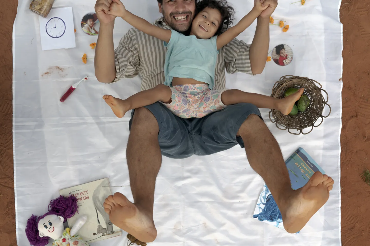 Daughter and father playing