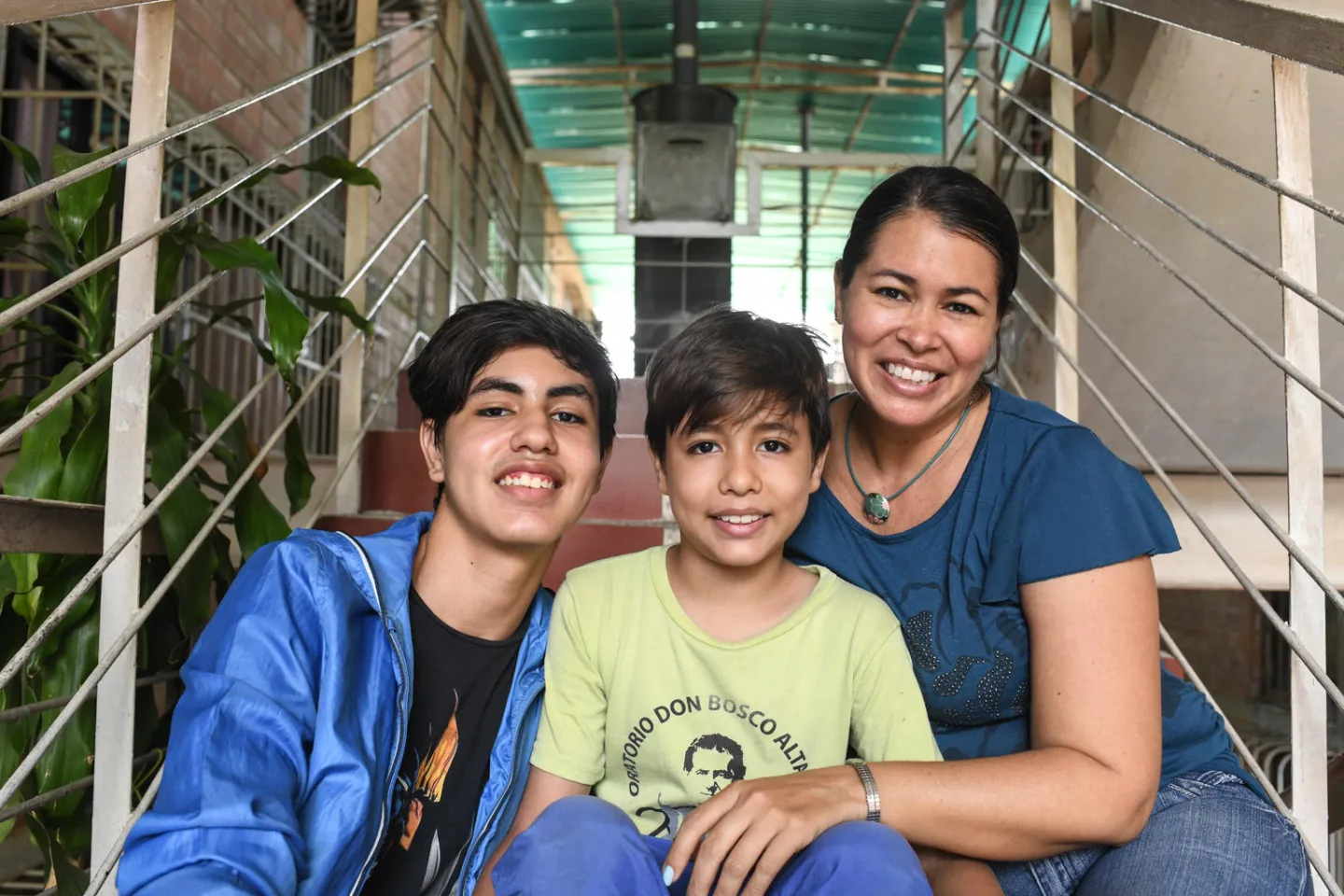 A family portrait of Erika Quintana (right), mother of Eduardo Fonseca, 9, (centre) and Fernando Fonseca, 17, (left) in the City of Guatire, in August 27, 2020.