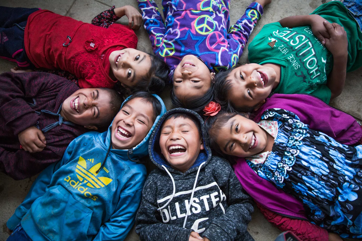 You nearly hear the laugh of these children of the indigenous community of Chicoy of Todos Santos Cuchumat&aacute;nin in the province of Huehuetenango, Guatemala on October 16, 2019 as they enjoy their last day of school.