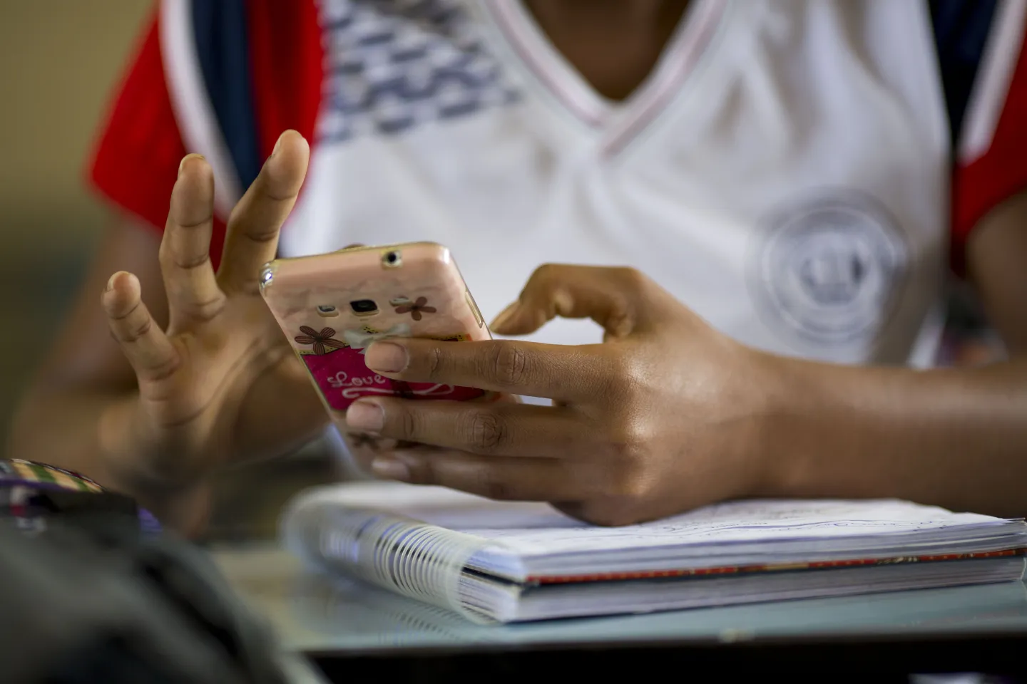 A student using his mobile phone.