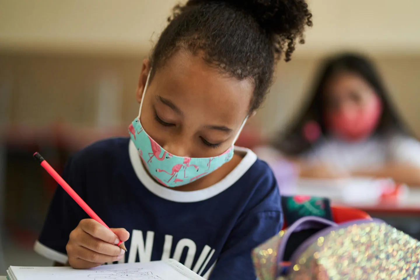 During the COVID-19 pandemic, on 19 February 2021, Jaqueline Cerqueira, 10, sits on the classroom in the Brigadeiro Gavi&atilde;o Peixoto State School, in S&atilde;o Paulo, Brazil.