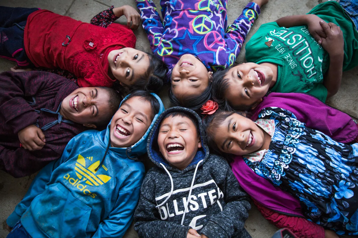 You nearly hear the laugh of these children of the indigenous community of Chicoy of Todos Santos Cuchumat&aacute;nin in the province of Huehuetenango, Guatemala on October 16, 2019 as they enjoy their last day of school. 