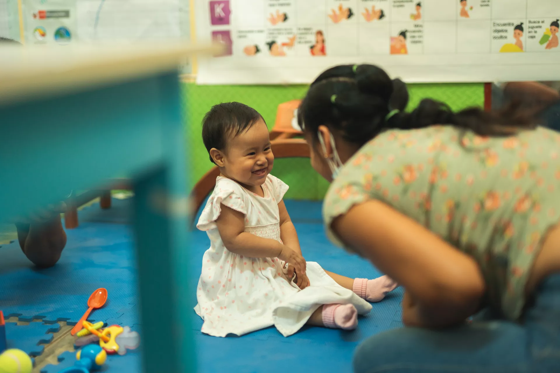Ucayali, Per&uacute;, June 2021. A family visits the pediatrician for a routine check-up. Doctor Berita Sifuentes Rengifo counsels the family on Care for Child Development (CCD), a programme implemented by UNICEF in Latin America and the Caribbean.