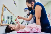 Ocu, Panama, June 2021. A mother visits the pediatrician for a routine check-up of her baby daughter. Doctor Cornelia Thomas counsels her on Care for child Development (CCD), a program implemented by UNICEF in Latin America and the Caribbean.