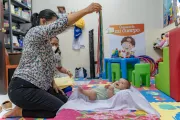 San Juli&aacute;n, Sonsonate, El Salvador. June 2021. A mother and her baby visit the pediatrician for a routine check-up. Doctor Guadalupe de Romero counsels the family on Care for Child Development (CCD), a programme implemented by UNICEF in Latin America and the Caribbean.