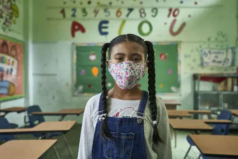 A student in an empty classroom in Panama City, Panama.