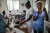 Las enfermeras atienden a un bebé en el centro de vacunación del Hospital Immaculée Conception, el más grande de Les Cayes.