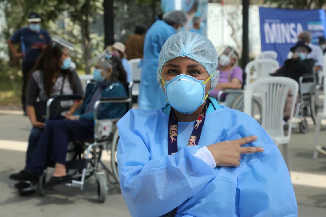 A nurse was vaccinated against COVID-19 at a vaccination site in the district of San Mart&iacute;n de Porres in Lima, Peru on 24 March 2021. 