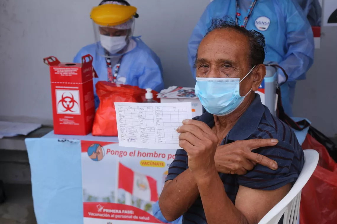 Older adults started to receive COVID-19 vaccines at a vaccination site in the district of San Mart&iacute;n de Porres in Lima, Peru on 24 March 2021.