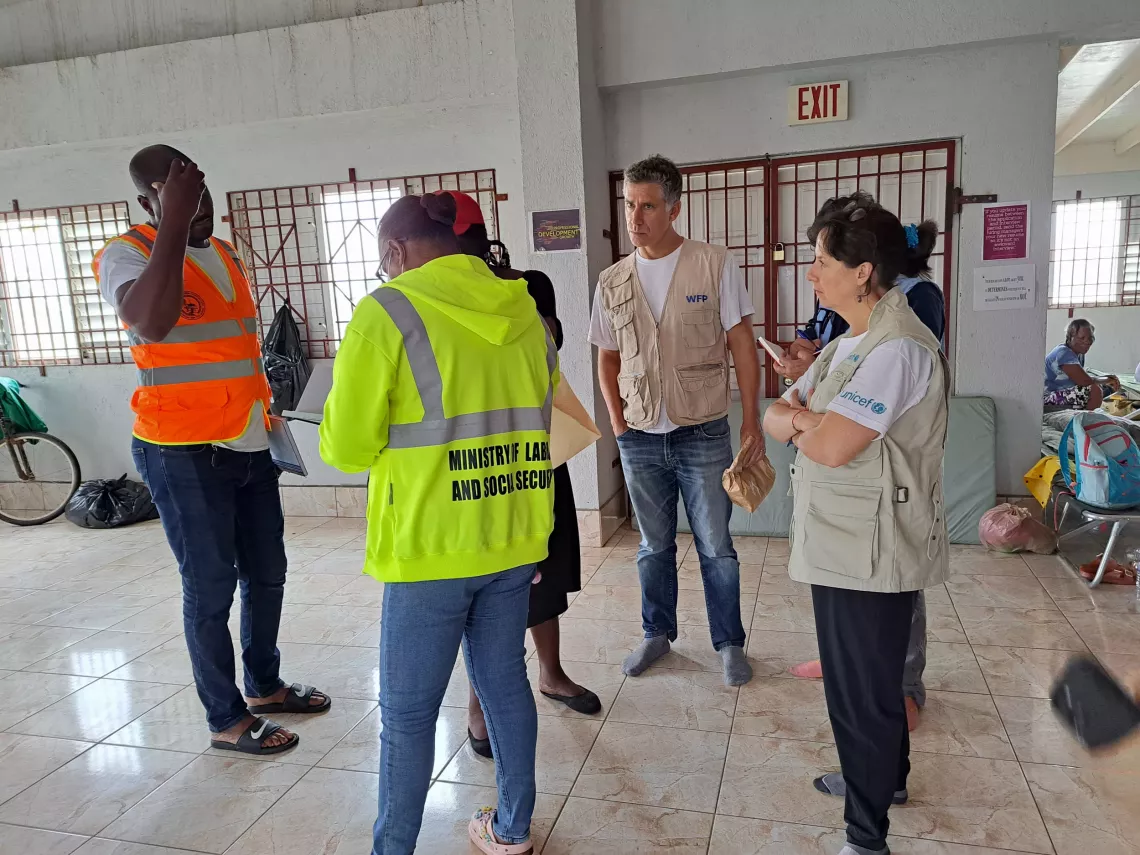 UNICEF personnel visit a community affected by the hurricane