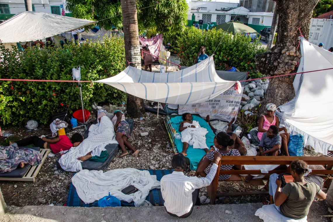 An overview of Les Cayes residents waiting for medical attention at Immaculee Conception Hospital