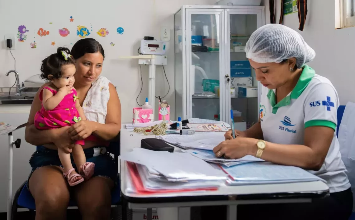 A woman and her baby at a medical consult