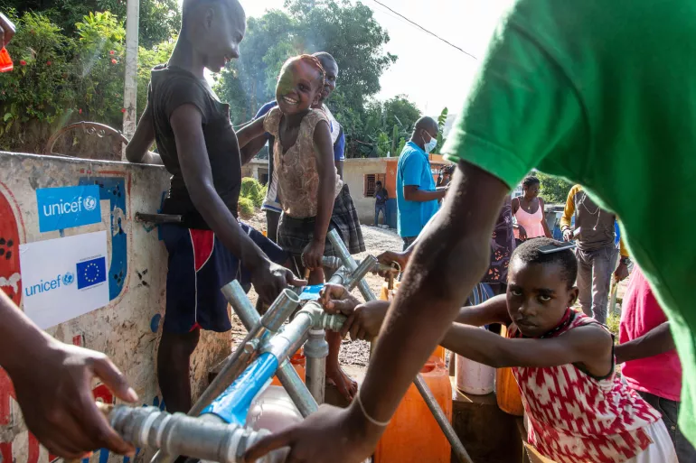 On 18 August 2021, in Marceline, near Camp Perrin district, children and their families have access to clean and safe water at one of the four water stations supported by UNICEF in Les Cayes, Haiti.