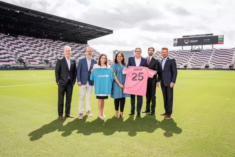 UNICEF and Inter Miami CF representatives pose for a photo prior to the press conference announcing the launch of a new partnership