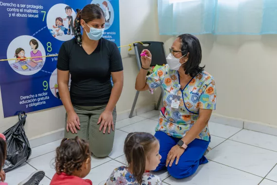 San Juli&aacute;n, Sonsonate, El Salvador. June 2021. Toddlers play during a routine check-up. Care for Child Development (CCD), a programme implemented by UNICEF in Latin America and the Caribbean.