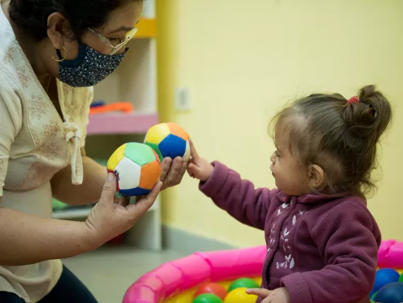&Ntilde;emby, Central, Paraguay. June 2021. Toddler during routine check up with the pediatrician. Doctor Cirila Quintana counsels the family on Care for child Development (CCD), a programme implemented by UNICEF in Latin America and the Caribbean.