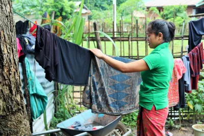 Barely any time to freshen up in the morning, Xaiathon prepares the day&rsquo;s meals for the boys for when she and her husband are at the farm all day. In between cooking meals, she checks on her laundry, dampened by the rain from the night before.