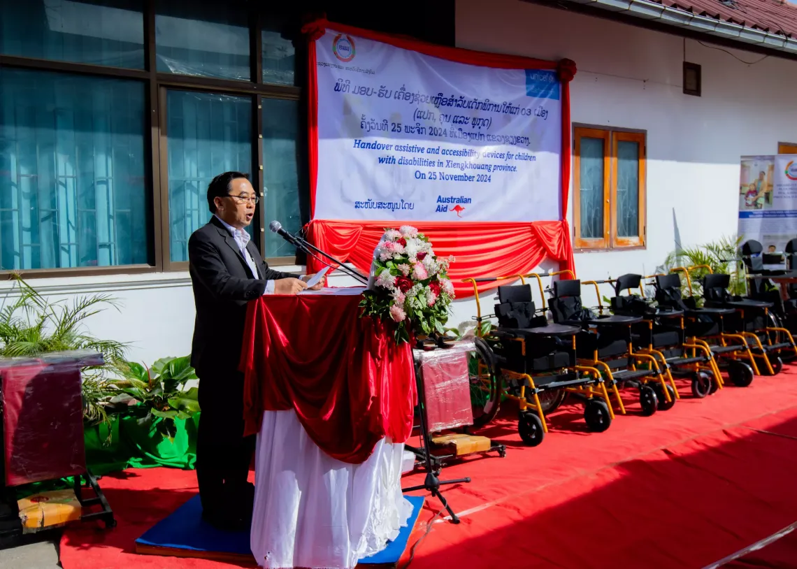Mr. Lee Pao Yang, Vice Minister of Labor and Social Welfare, speaking at the handover ceremony of assistive devices to children with disabilities in Xiengkhouang province, Lao PDR.