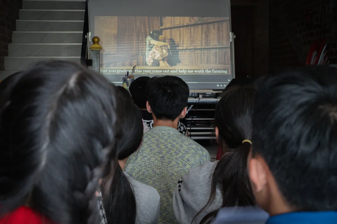 A screening of Khamhorm, a film portraying early marriage that was produced by young people from a Filmmaking - Happy Families Grow Together program, UNICEF Laos.