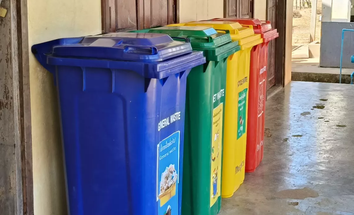 Garbage bins for separating waste at Somsouk Primary School.